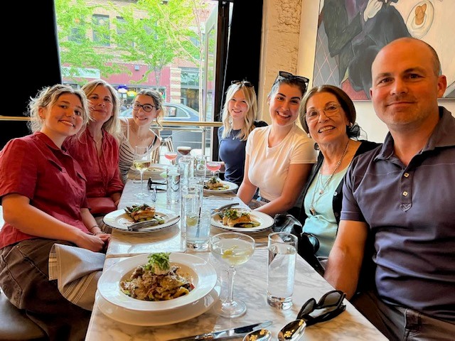John Vance and family celebrating Lauren’s graduation in Boise with a special dinner